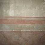 Detail, imitation marble ridge of walls of fireplace room